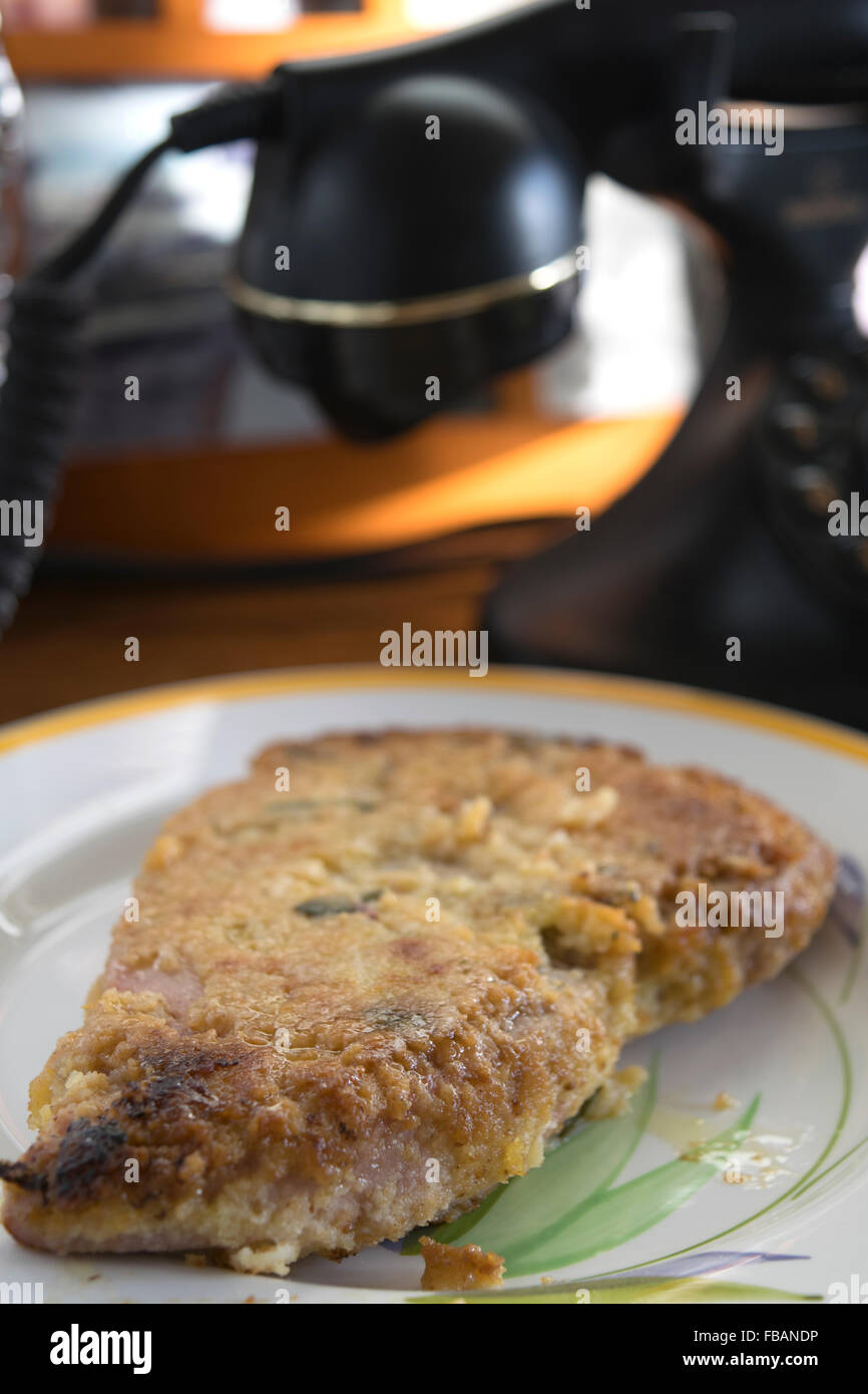 breaded tuna steak fried in pan with vinaigrette and aromatic herbs Stock Photo Alamy