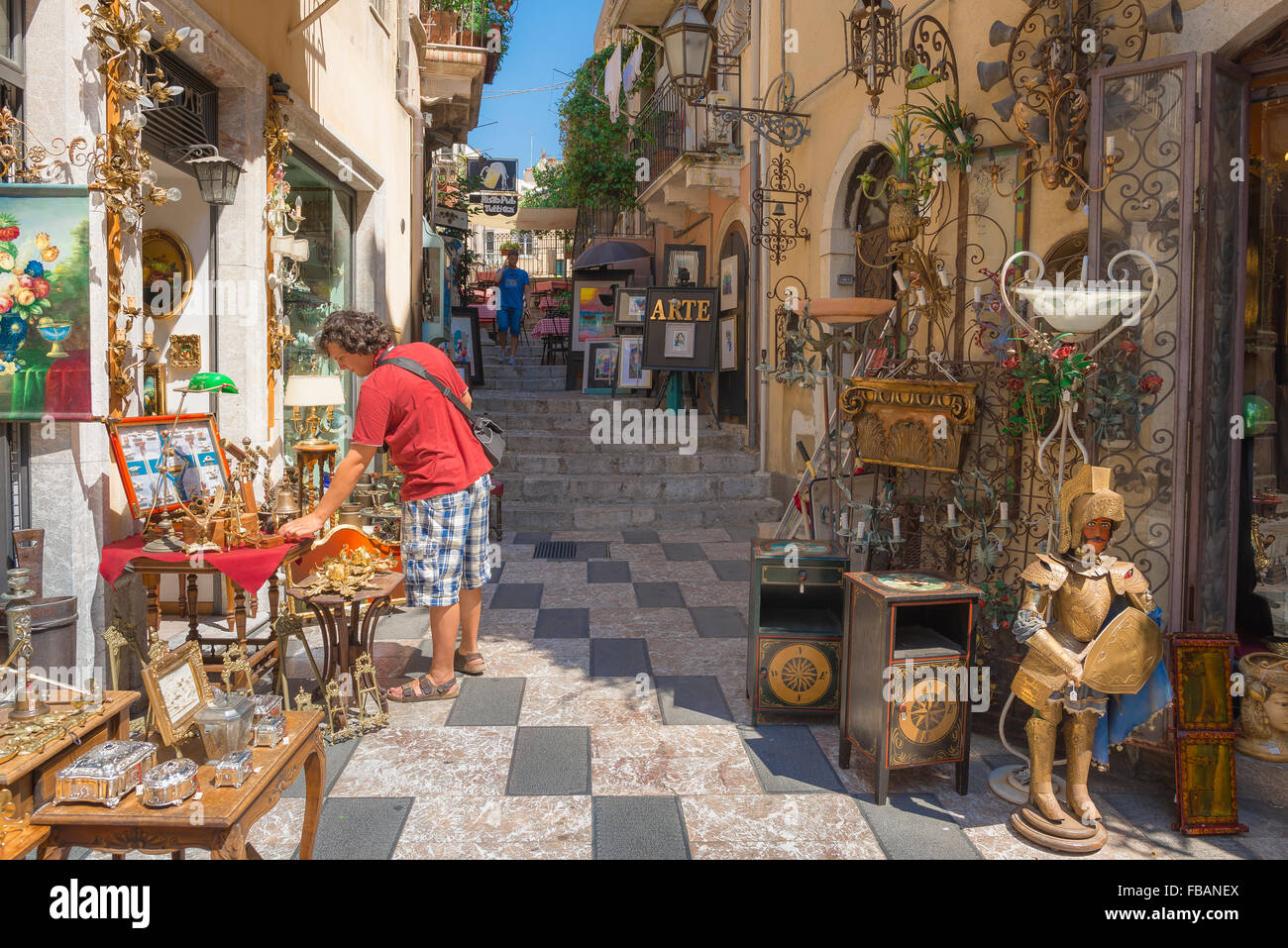 Sicily shopping Taormina, view of a tourist in Taormina examining Stock