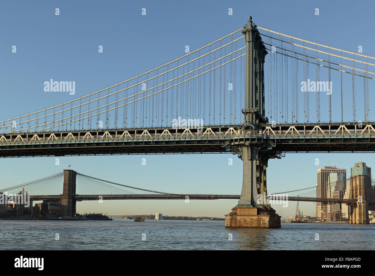 Manhattan Bridge and Brooklyn Bridge, both spanning the East River and joining Brooklyn to Manhattan's Lower East Side in NYC Stock Photo