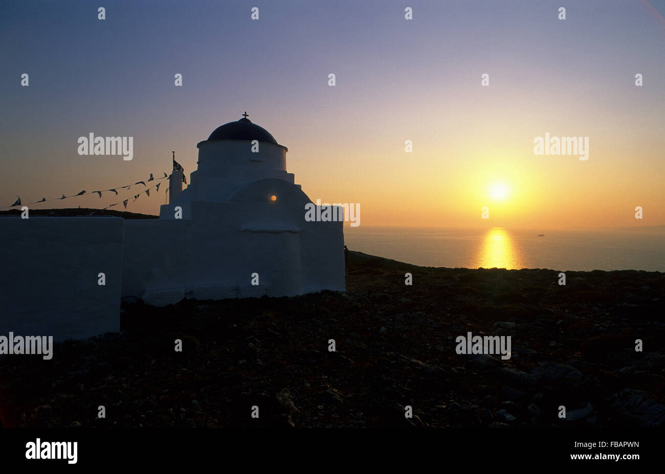 Sunset at Agios Georgios Church, Heronissos Sifnos, Cyclades, Greece Stock Photo
