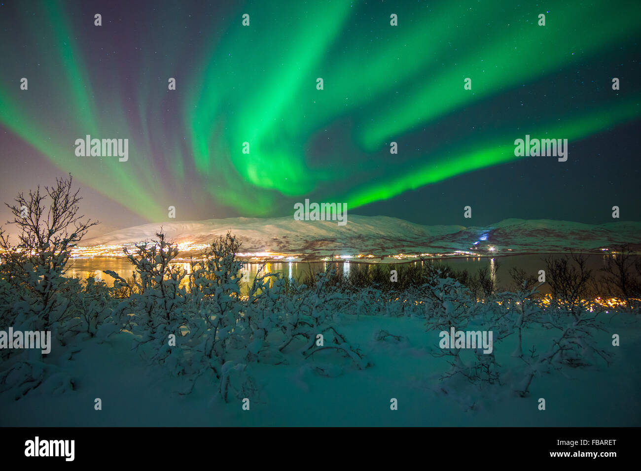 Aurora Borealis over Tromso, Northern Norway Stock Photo