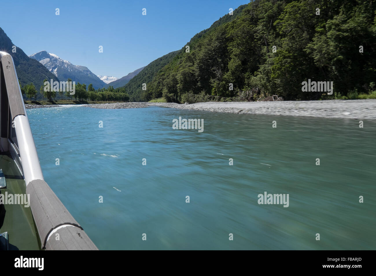 Travelling up the Matukituki River on a jet boat Stock Photo