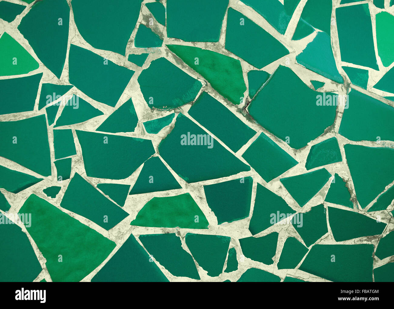 Grunge green broken tiles background Stock Photo