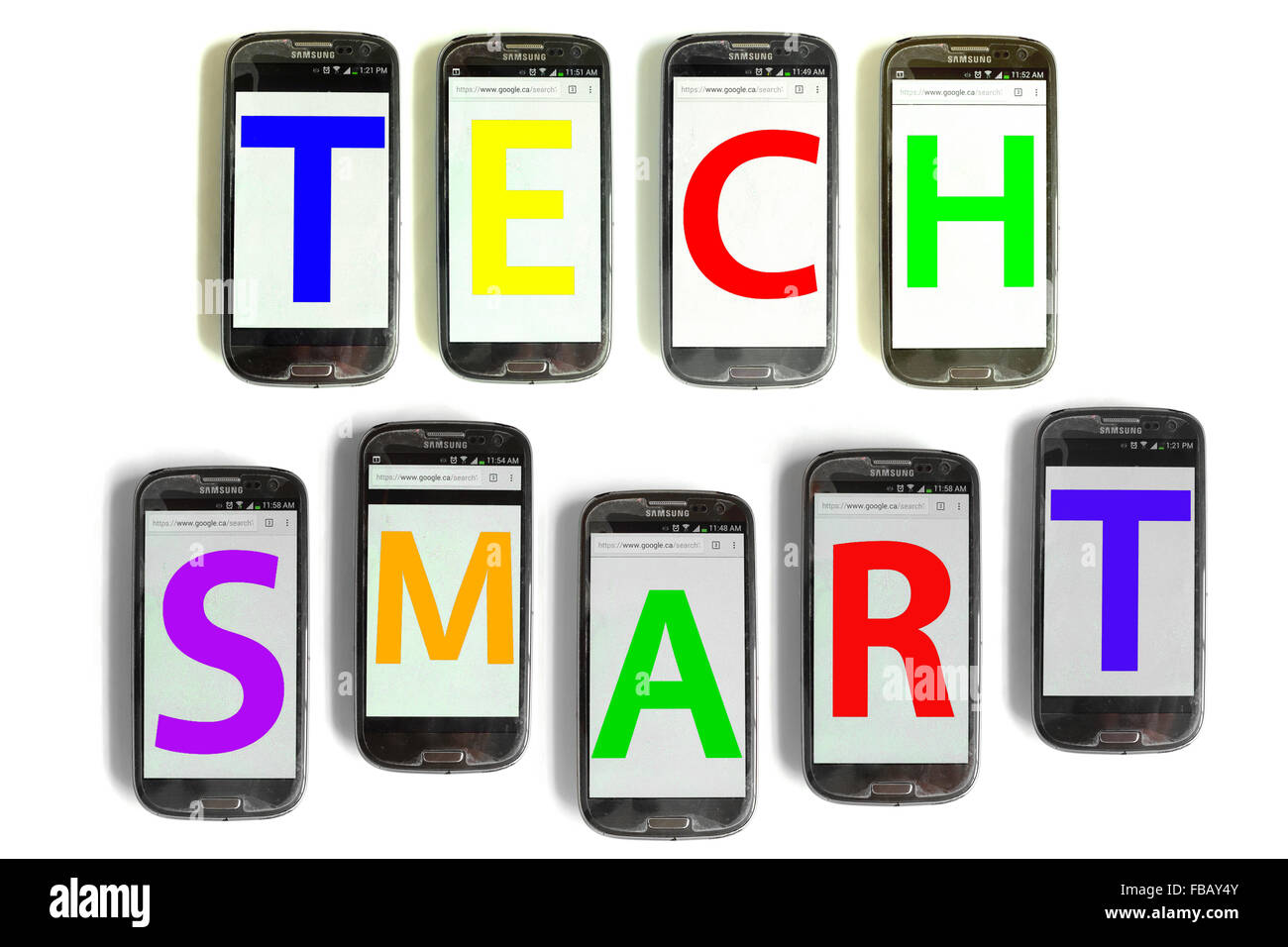 Tech Smart spelled out on mobile phone screens photographed against a white background. Stock Photo