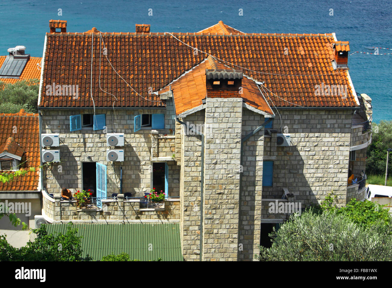 Common Balkans buildings in Sveti Stefan, Montenegro Stock Photo