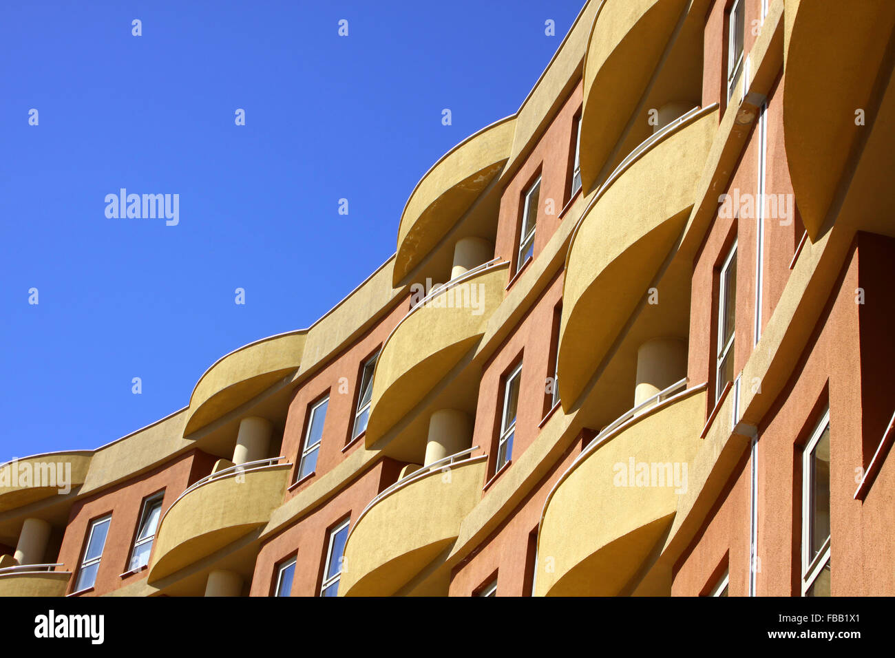 Close-up modern building with blue sky background Stock Photo - Alamy