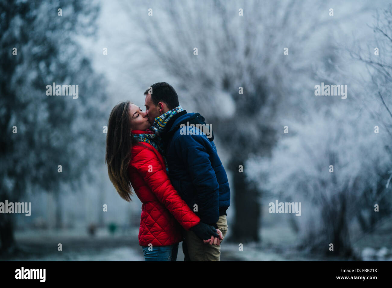 man carries his girlfriend on back Stock Photo Alamy