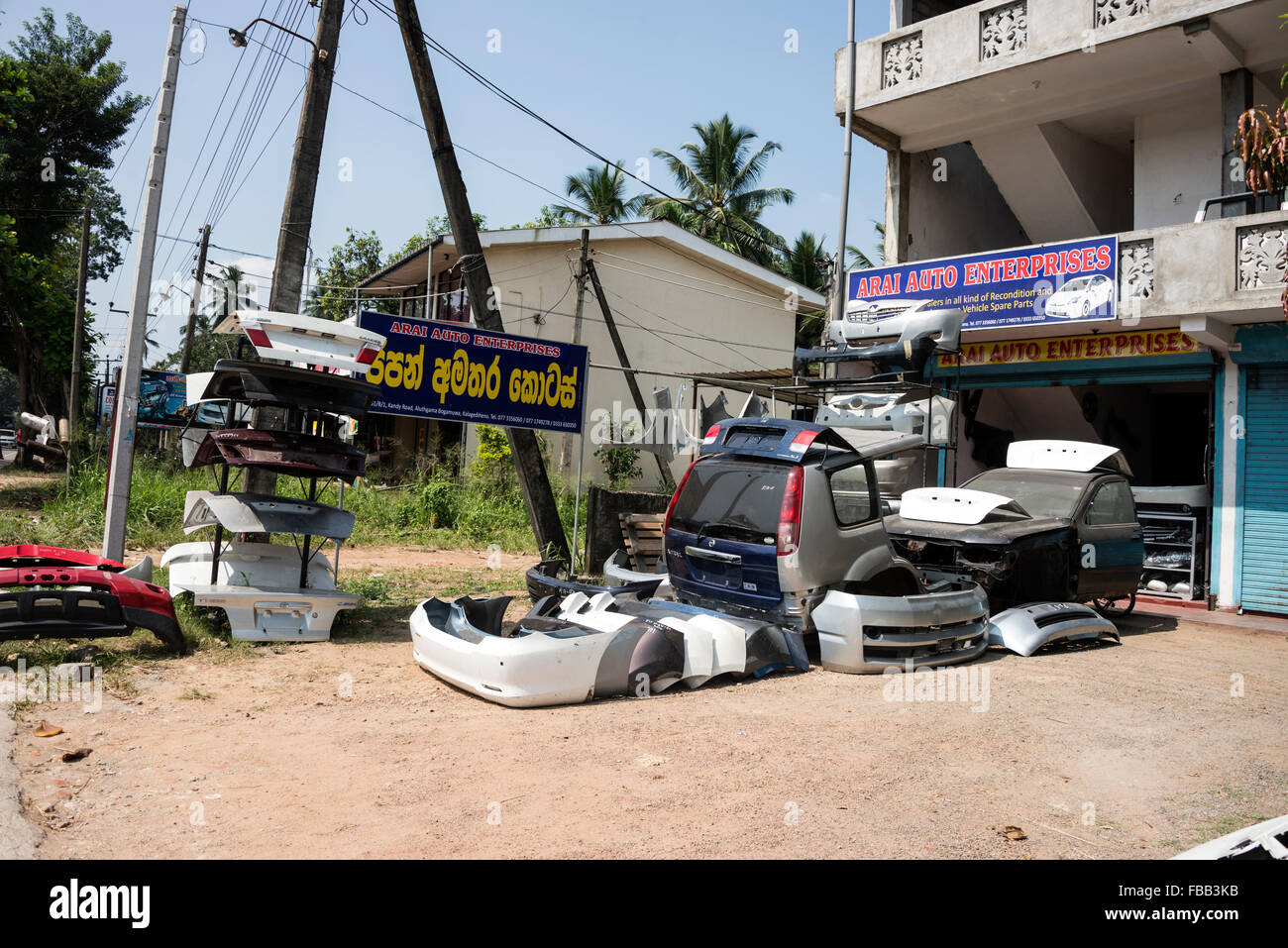 A number of small secondhand car parts shops on the A1 highway (Colombo