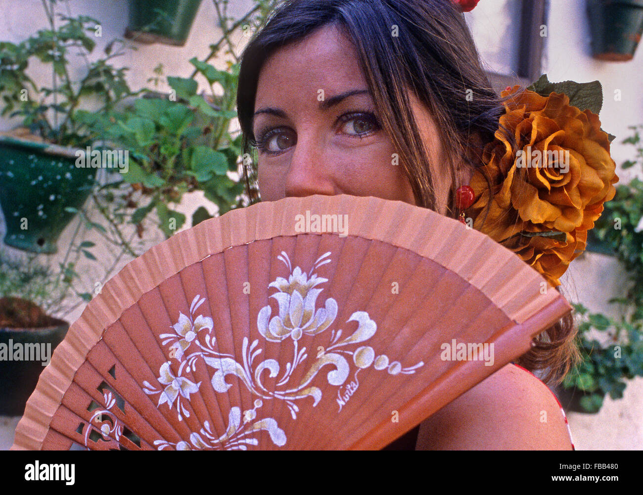 Córdoba.Andalusia. Spain: Portrait of woman wearing traditional suit during the May Fair Stock Photo
