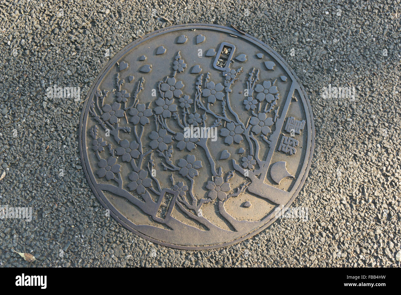 Decorative manhole cover in Tokyo Stock Photo
