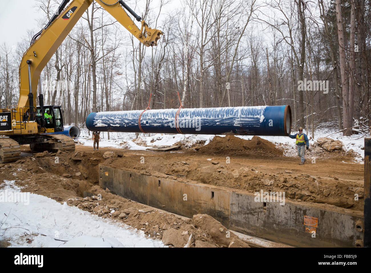 Columbiaville, Michigan USA - 13th January 2016 - Construction of a water pipeline for Flint, Michigan and surrounding areas. The pipeline will take water from Lake Huron through a 70-mile pipeline. Flint's decision to draw its water from the Flint River until construction is complete--instead of continuing to buy it from Detroit--has led to elevated levels of lead in Flint children. Credit:  Jim West/Alamy Live News Stock Photo