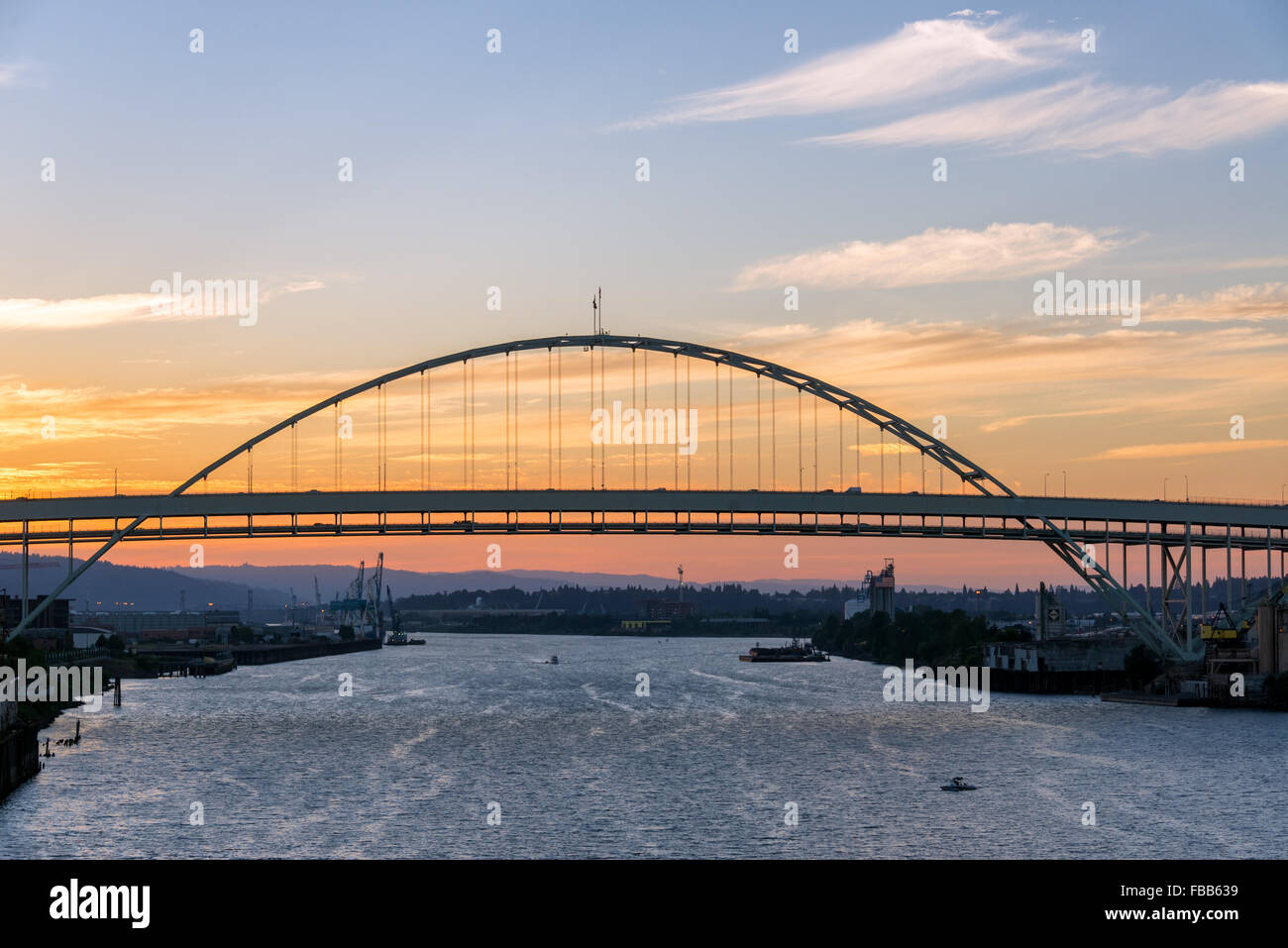 Fremont Bridge in Portland, Oregon at sunset at the end of a beautiful summer day Stock Photo