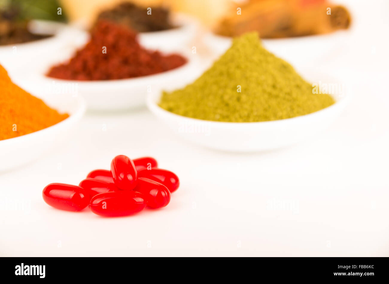 Beautiful delicate colorful display of different spices red green ...