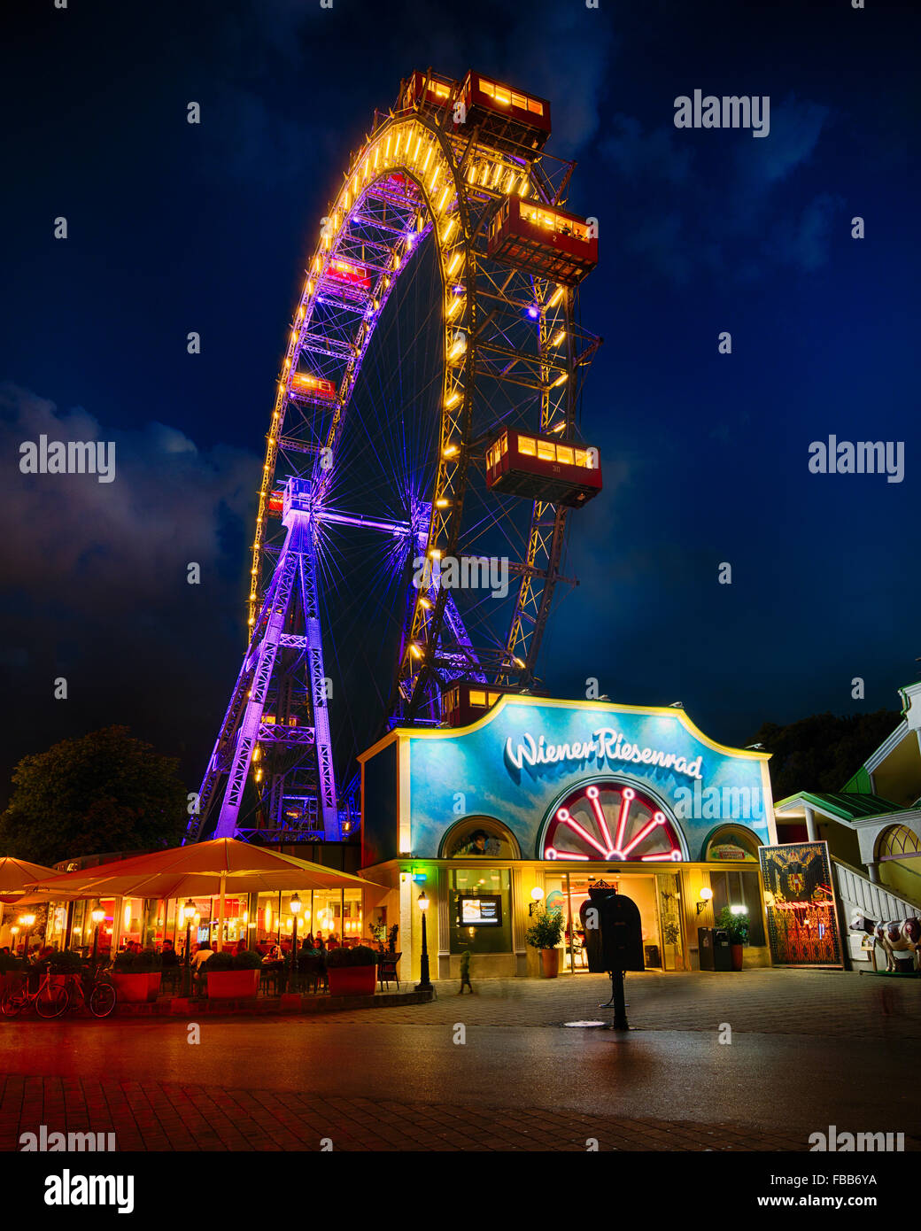 Low Angle Nighttime View of a Giant Ferris Wheel , Prater Amusement Park, Leopolstadt, Vienna, Austria Stock Photo