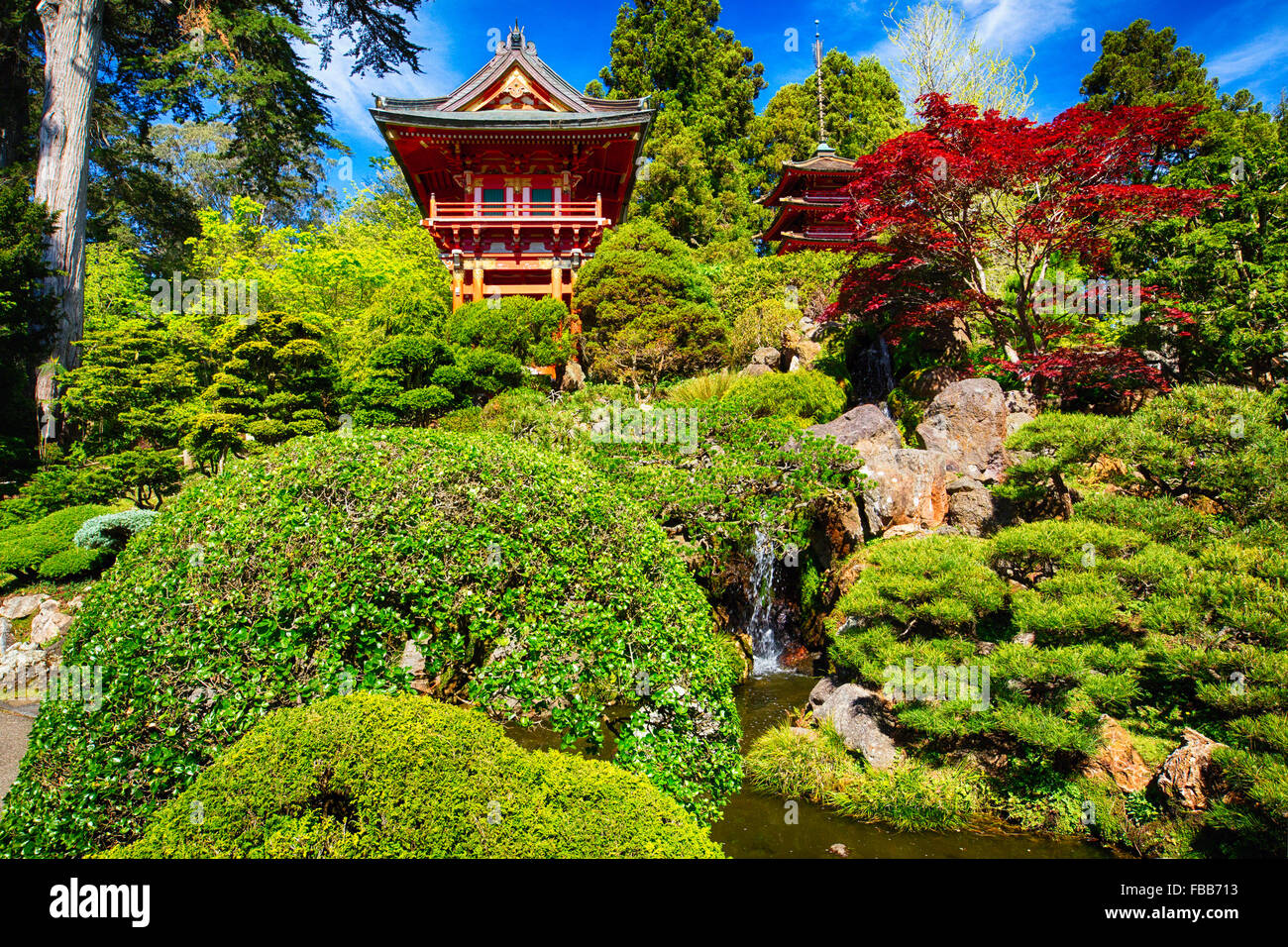Low Angle View of Traditional Japanese Pavilions in a Garden with a Small Waterfall, Japanese Tea Garden, Golden Gate Park, San Stock Photo