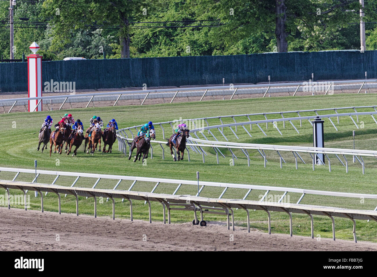 View of a Group of Jockeys on Horses Racing, Monmouth Park Racetrack, Oceanport, New Jersey Stock Photo