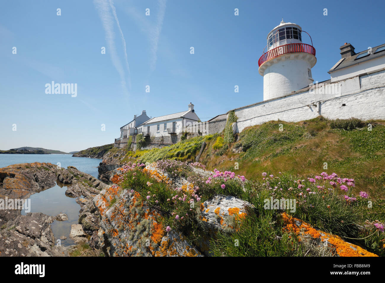 lighthouse at the Crookhaven Bay on Mizen peninsula, County Cork, Ireland Stock Photo