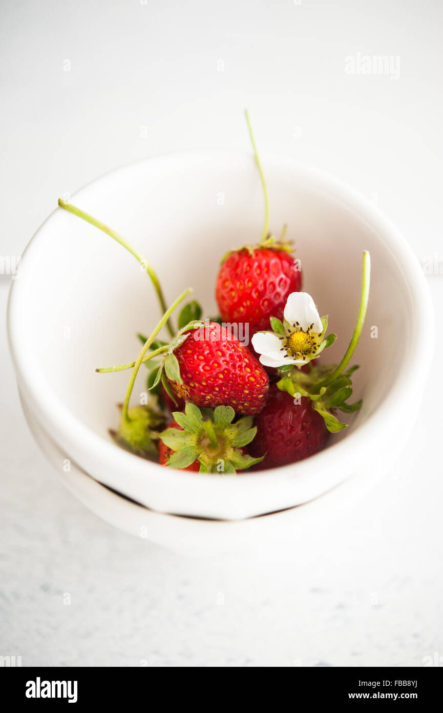 Fresh strawberries in a bowl Stock Photo
