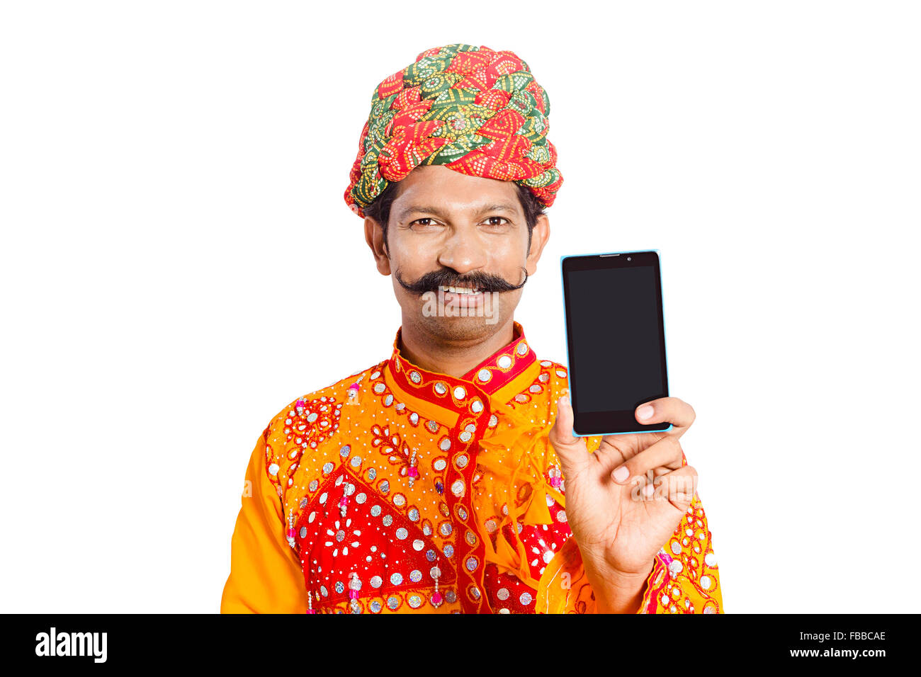 1 indian Rural Gujrati Villager Mobile Phone Quality showing Stock Photo