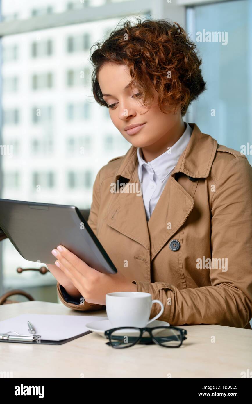 Young woman holding laptop Stock Photo - Alamy