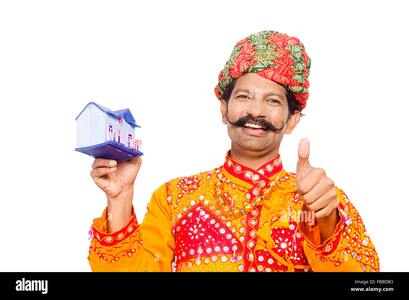 1 indian Rural Gujrati Villager New House Thumbs Up showing Stock Photo