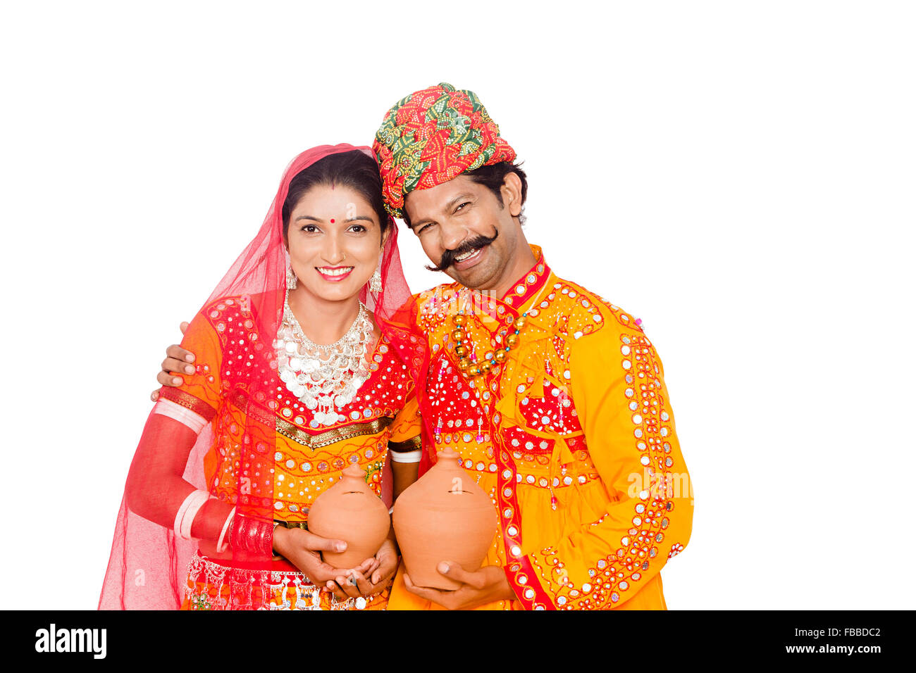 2 indian Rural Gujrati Married Couple Piggy Bank Saving money Stock ...