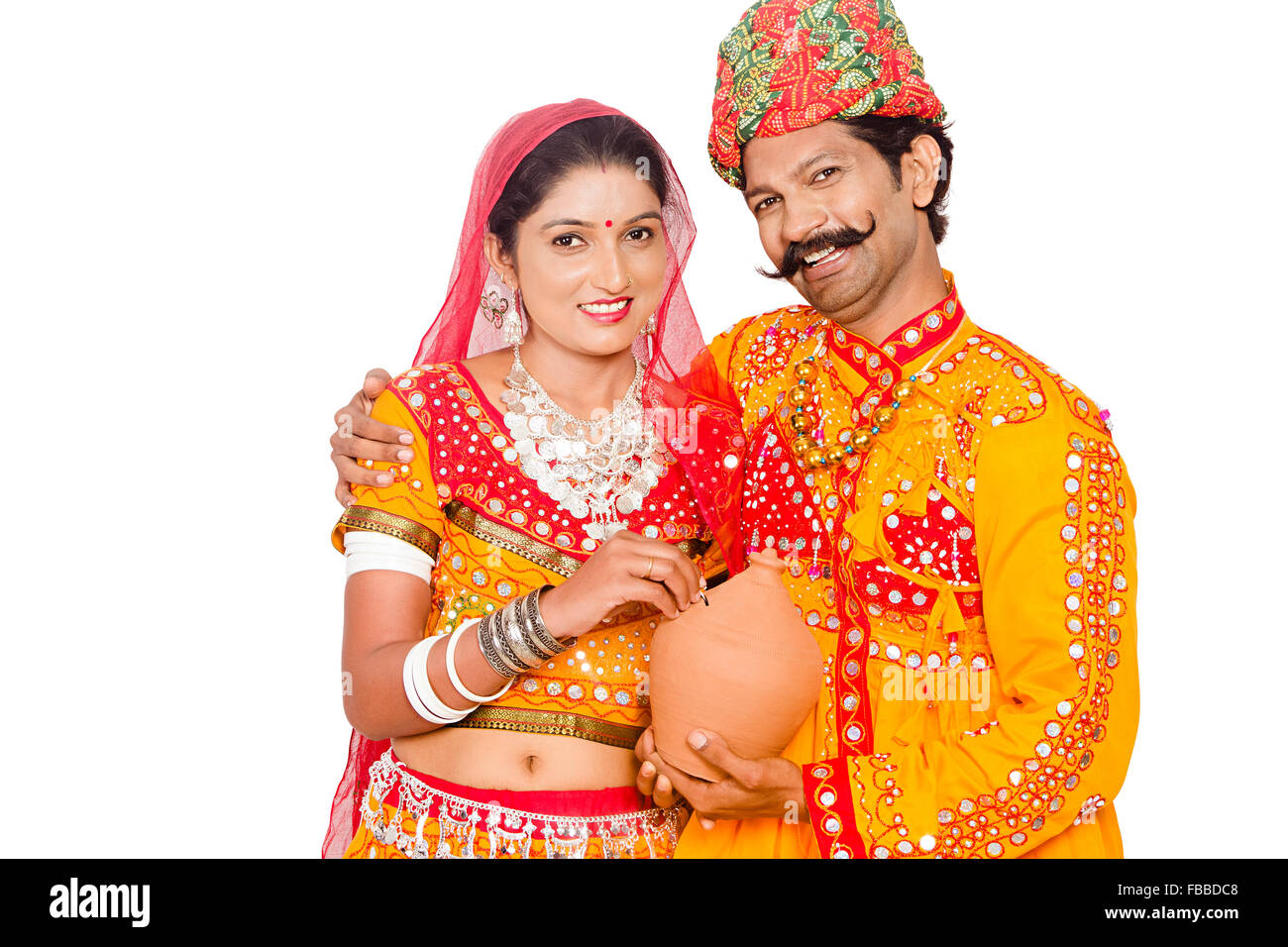 2 indian Rural Gujrati Married Couple Piggy Bank Saving money Stock ...