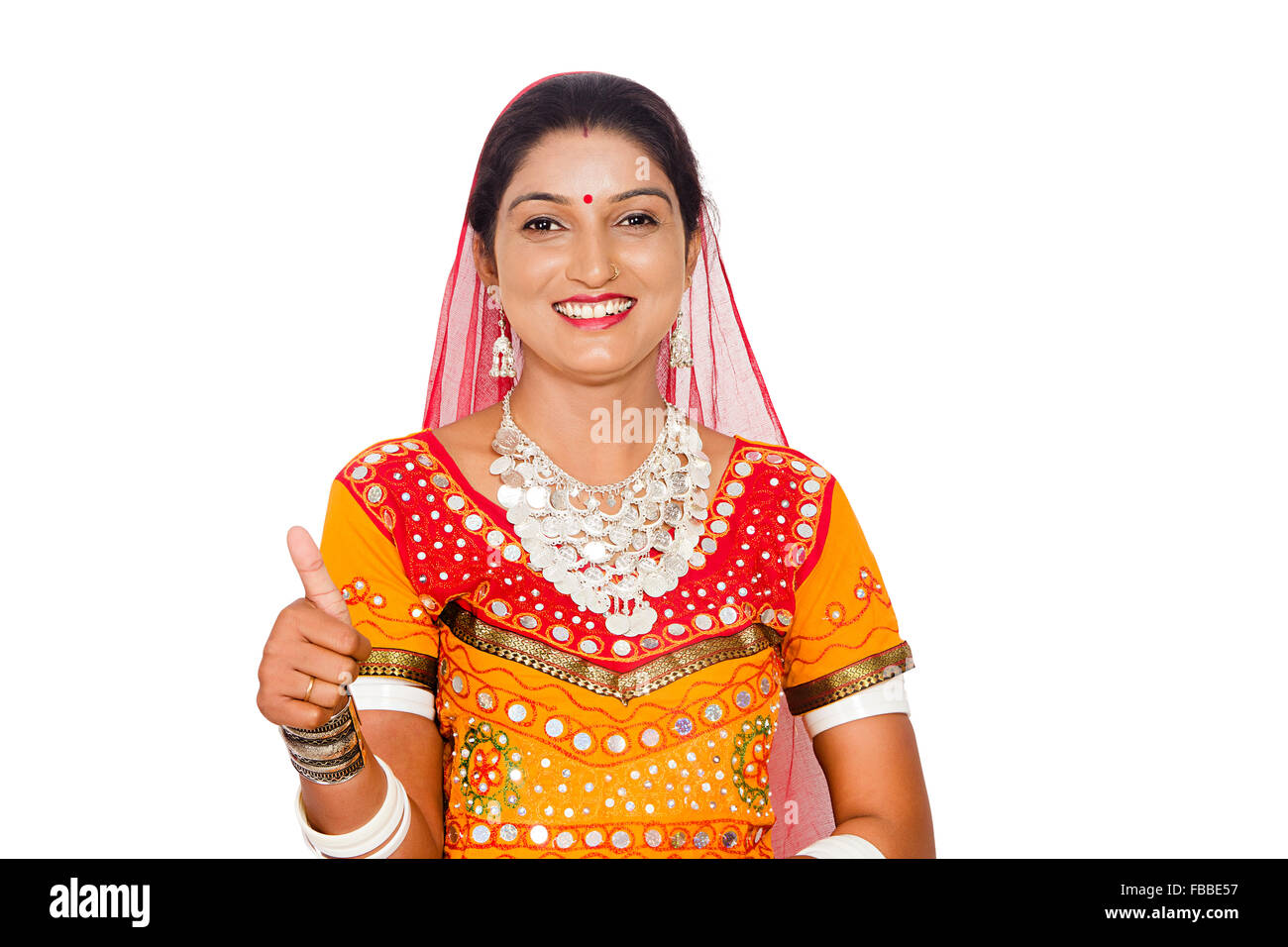 1 indian rural Gujrati woman Thumbs Up showing Stock Photo