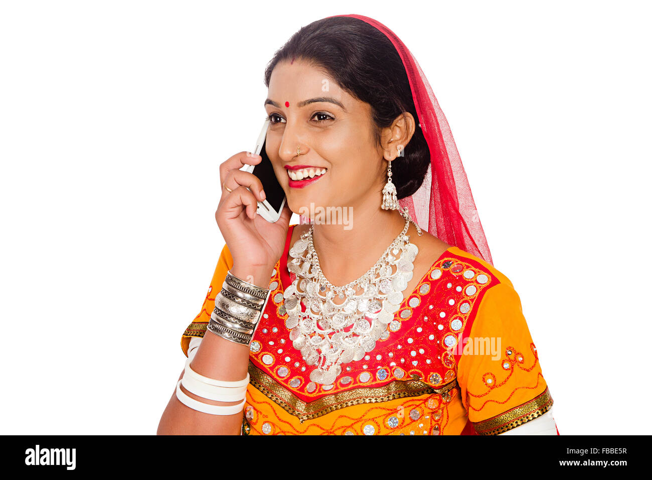 1 indian rural Gujrati woman Talking Mobile Phone Stock Photo