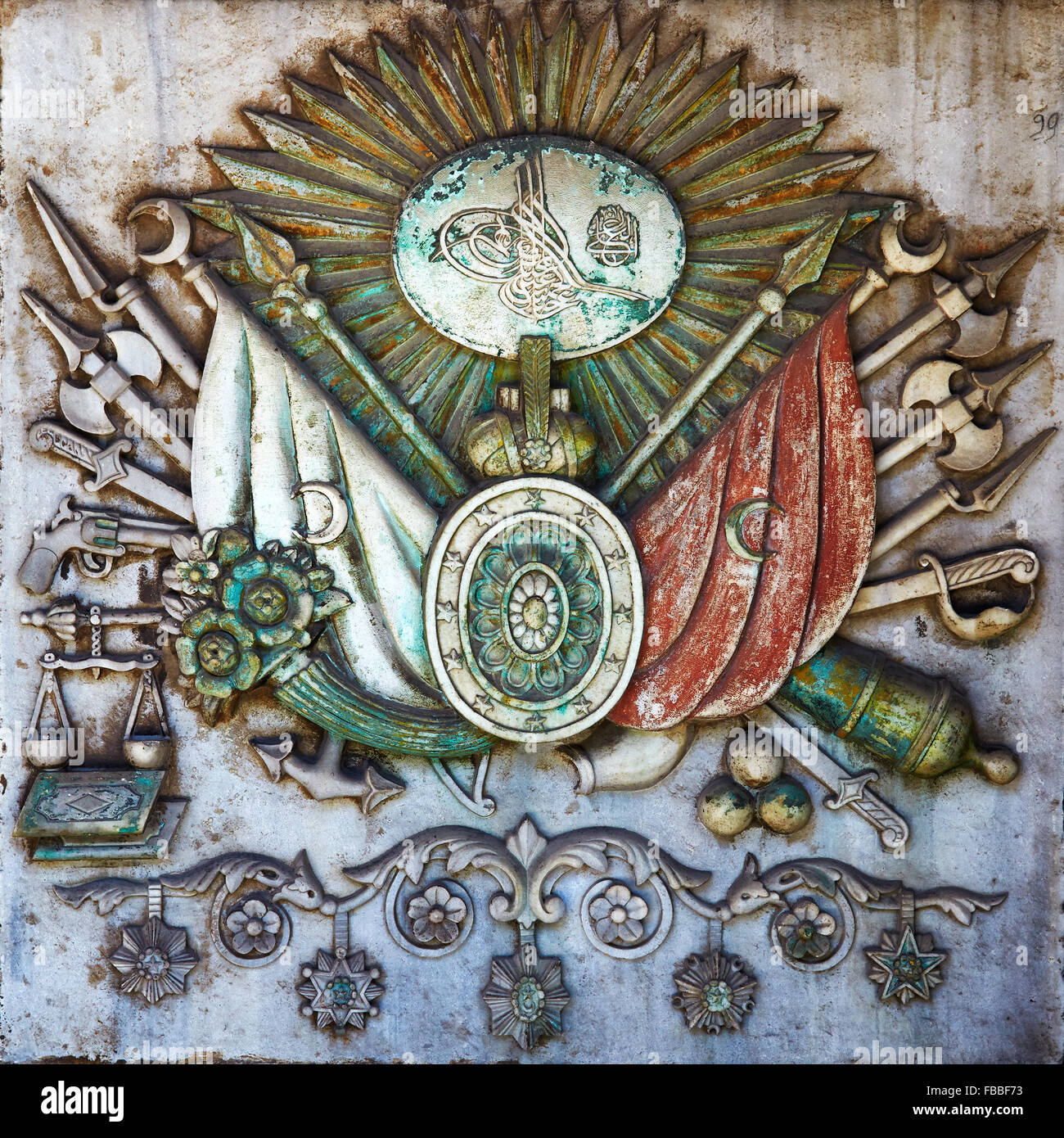 ISTANBUL, TURKEY - JULY 12, 2014: Coat of arms of the Ottoman Empire bas-relief on the wall on the territory of Topkapi Palace, Stock Photo