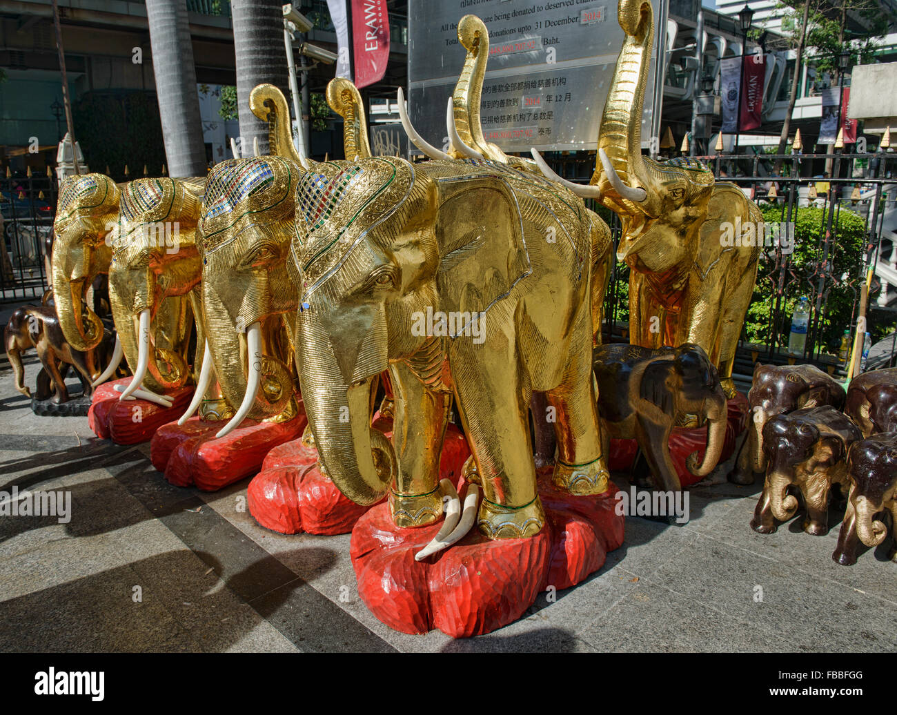 Gold elephants at the Erawan Shrine in Bangkok, Thailand Stock Photo