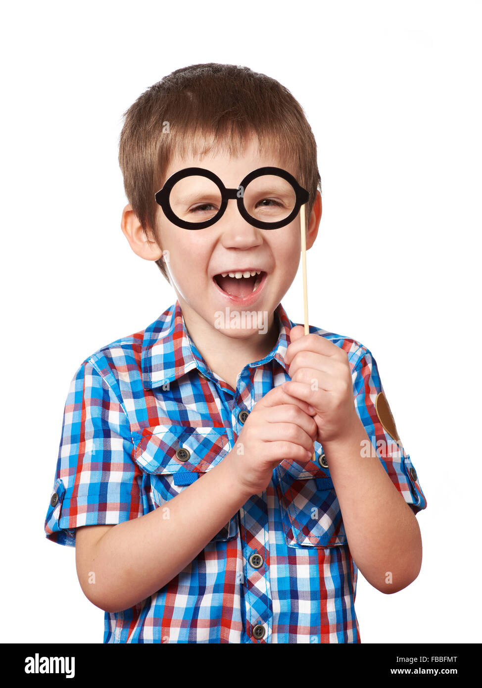 Little funny boy with glasses mask on stick isolated on white Stock Photo