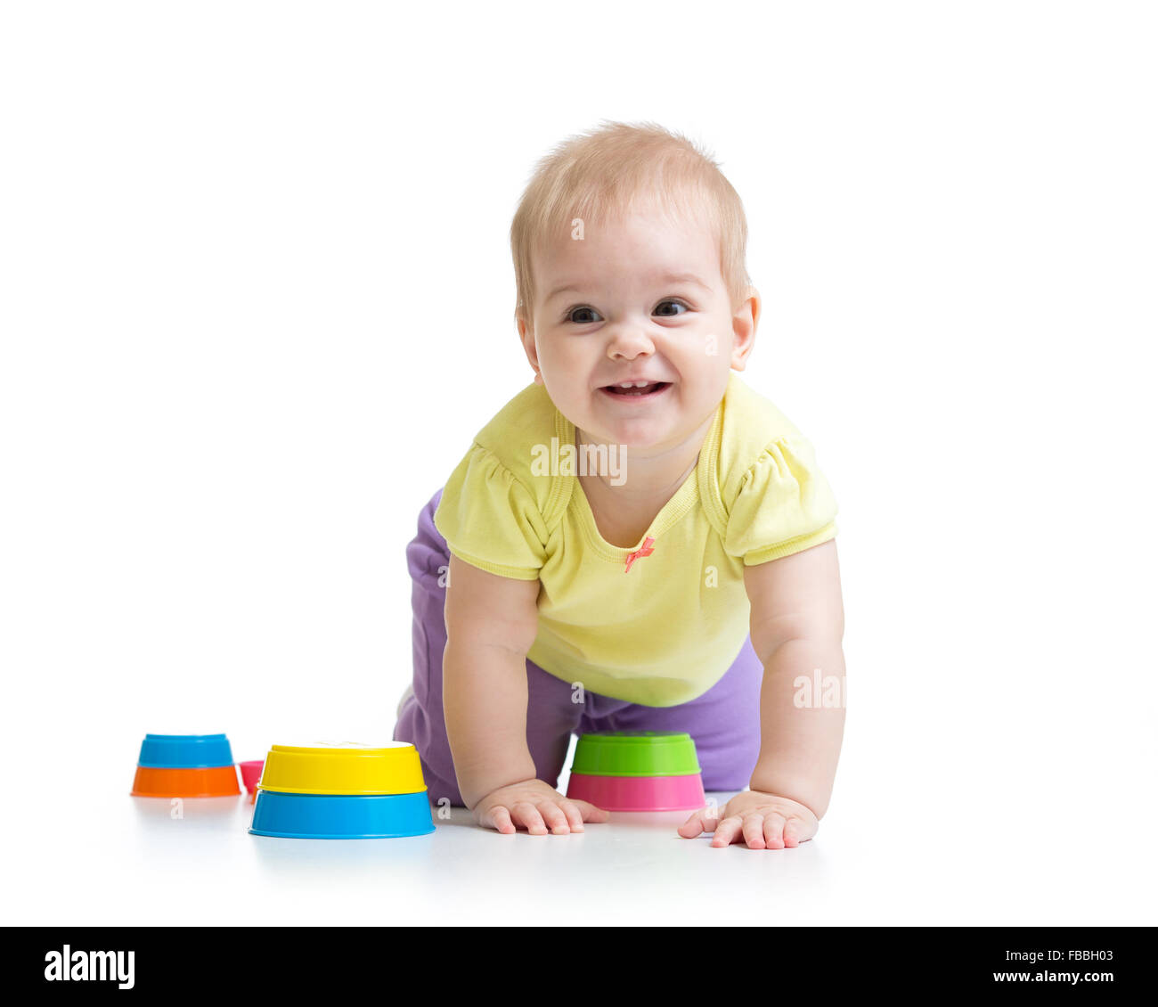 Cute little child is playing with toys Stock Photo - Alamy