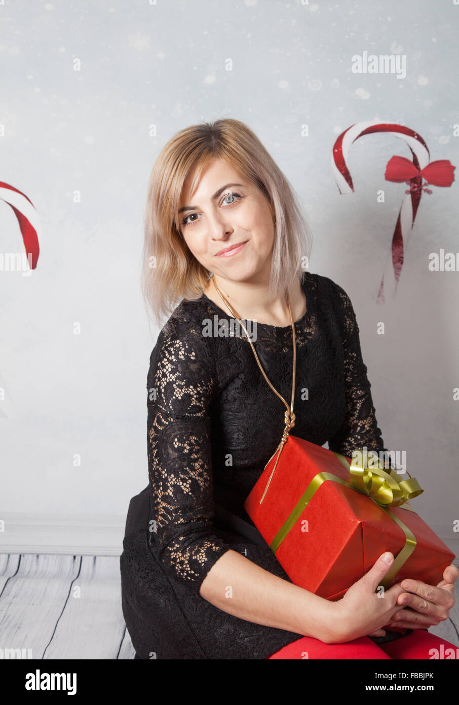 Beautiful woman portrait, Christmas themed portrait, studio shot. Stock Photo