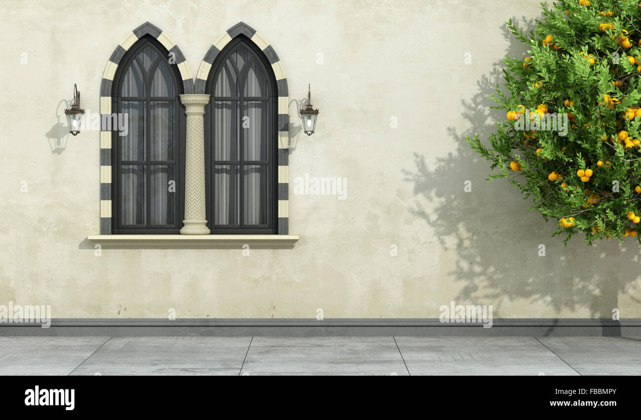 Old facade with mullioned gothic black window with stone frame and column- 3D Rendering Stock Photo