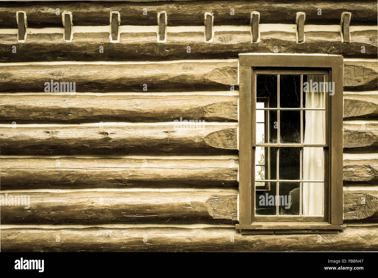 Exterior wall and window of a pioneer log cabin. Fayette State Historical Park. Stock Photo