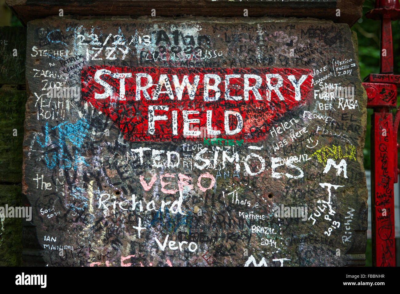 Graffiti on the wall of Strawberry Fields. Liverpool. England. Stock Photo