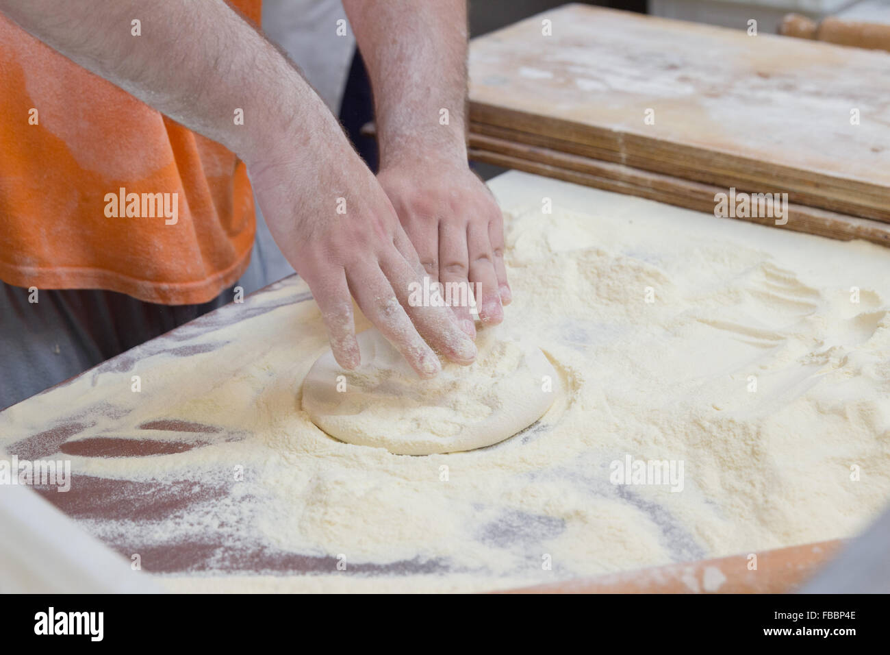 knead work dough flour cooking man table kitchen Stock Photo - Alamy