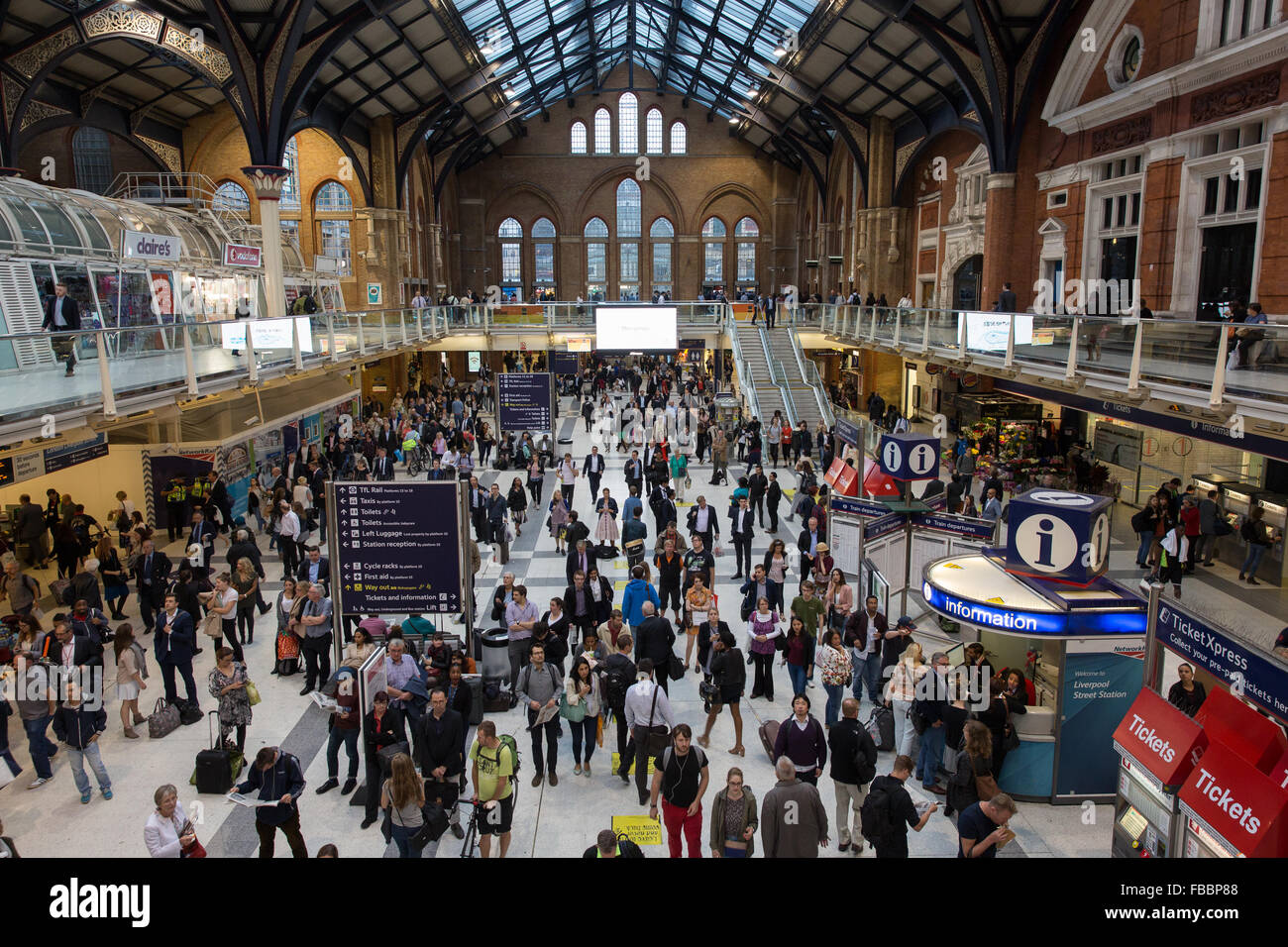 Commuters at Liverpool Street railway station in London. Stock Photo