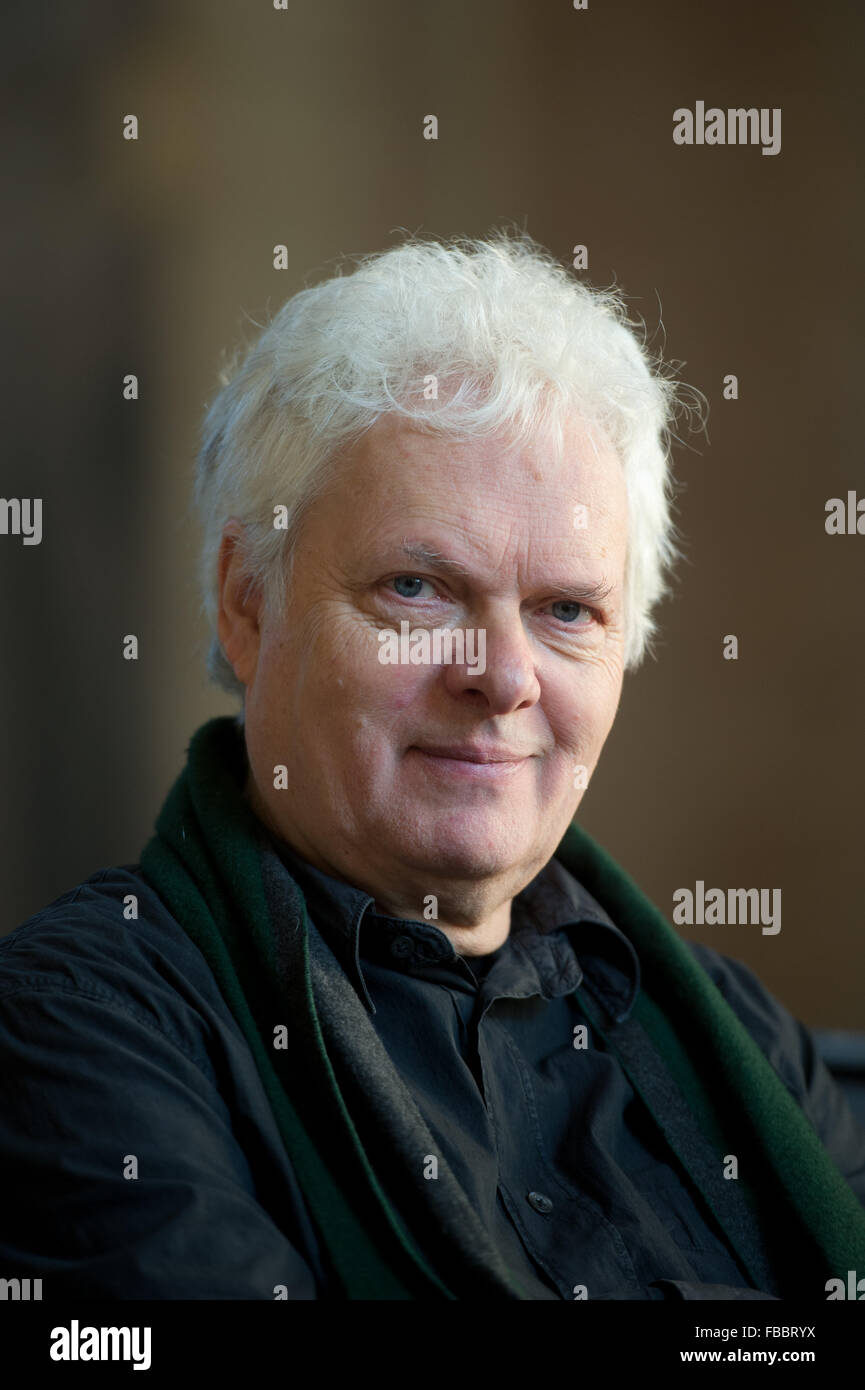 Composer and director Heiner Goebbels during the presentation of his multimedia installation 'Die Provinz des Menschen/The Human Province' in the Kunsthalle im Lipsiusbau in Dresden, Germany, 14 January 2016. The installation is made up of 54 different film sequences, played on a giant wall of monitors, together forming a composition that explores polyphony both as a musical and visual phenomenon and that presents an urban soundscape of various cities, criss-crossed by actor André Wilms. Visitors watch the same man observing the same rituals over the course of ten years, between 2004 and 201 Stock Photo