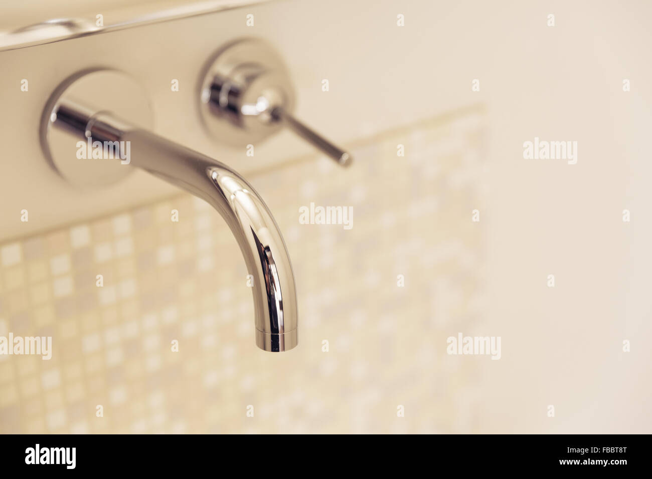 Detail of chrome faucet, selective focus Stock Photo