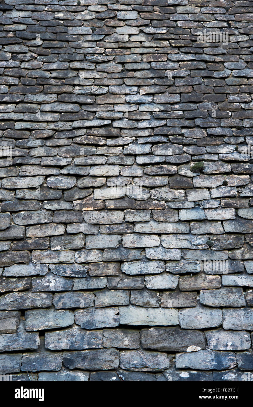 Old slate roof in the cotswolds. UK Stock Photo