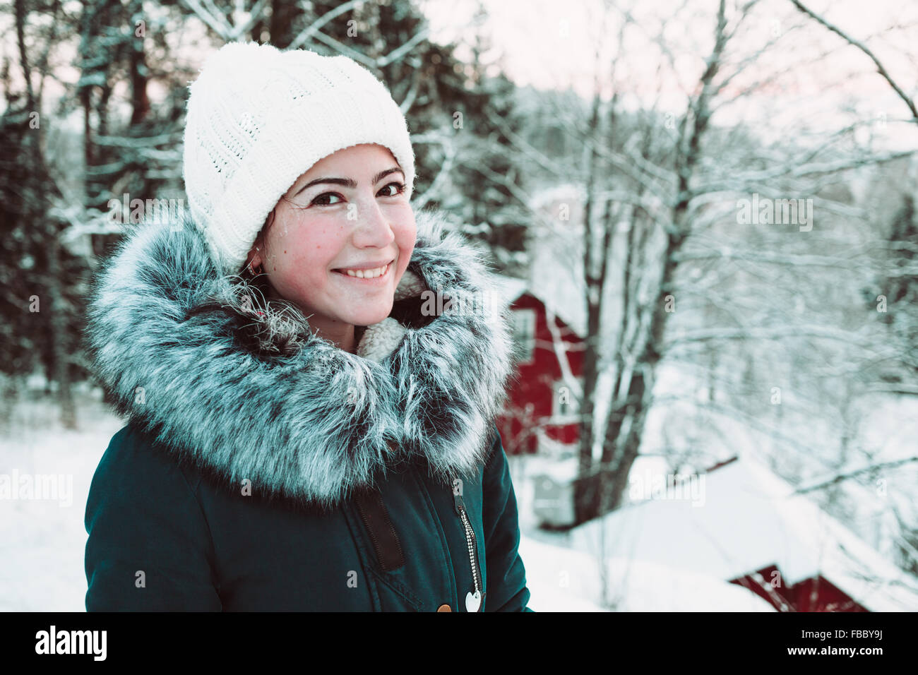 Beautiful young woman in the winter forest Stock Photo - Alamy