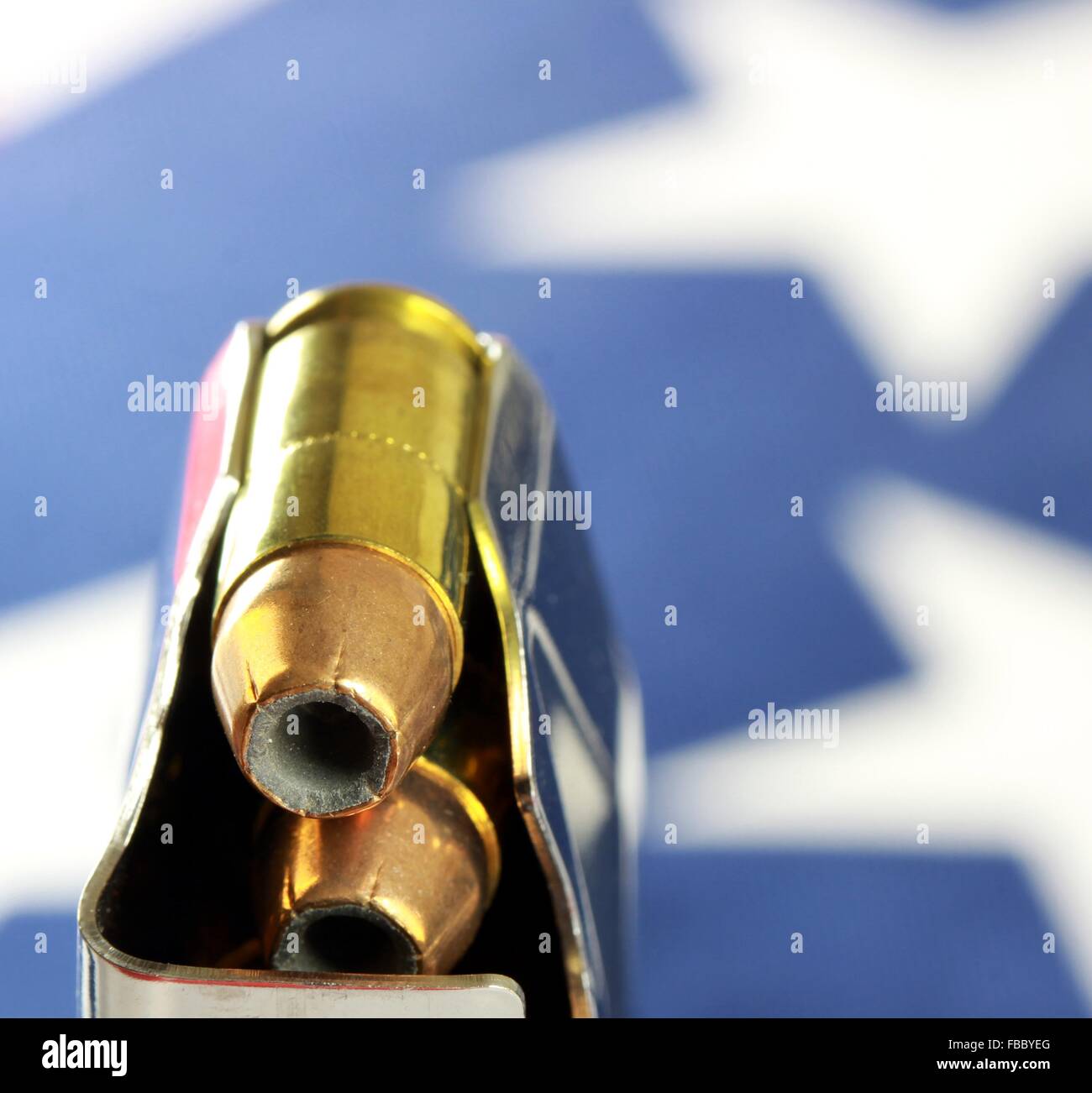 Bullets with gun clip on United States Flag Stock Photo
