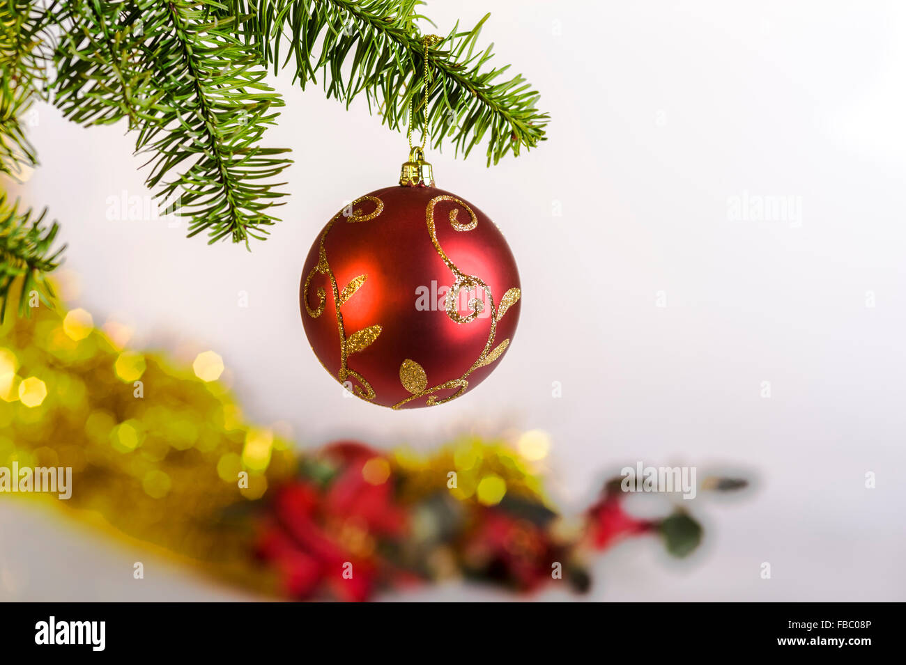 Bauble hanging from tree hi-res stock photography and images - Alamy