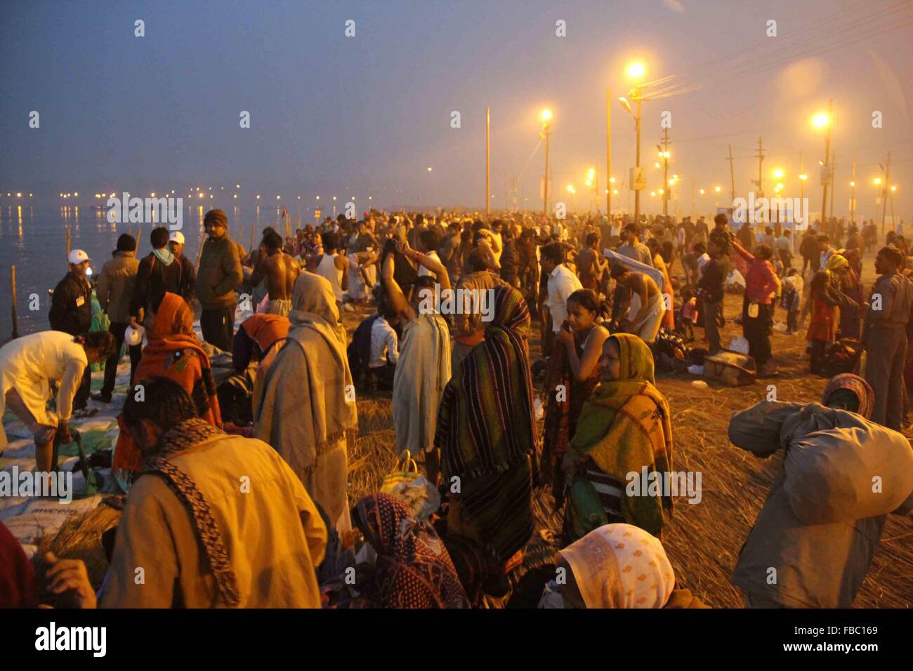 Devotees taking holy dip in river Ganges on the occasion of Makar Sankranti festival at Bank of river Ganges. Makar Sankranti is an Indian festival celebrated in almost all parts of India and Nepal in many cultural forms. It is a harvest festival. (Photo by Amar Deep / Pacific Press) Stock Photo