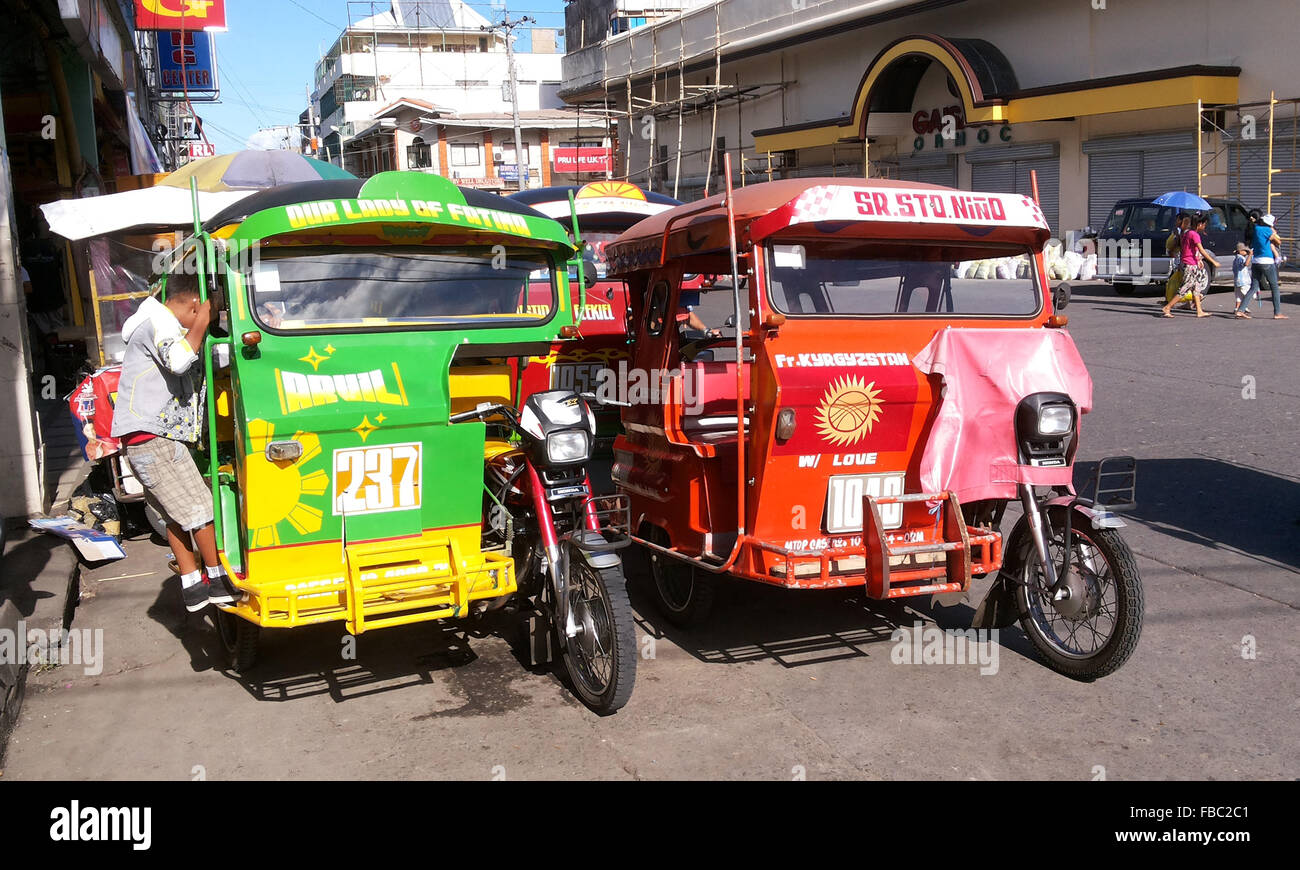 Philippines Leyte Ormoc city Motor tricycle taxis Adrian Baker Stock