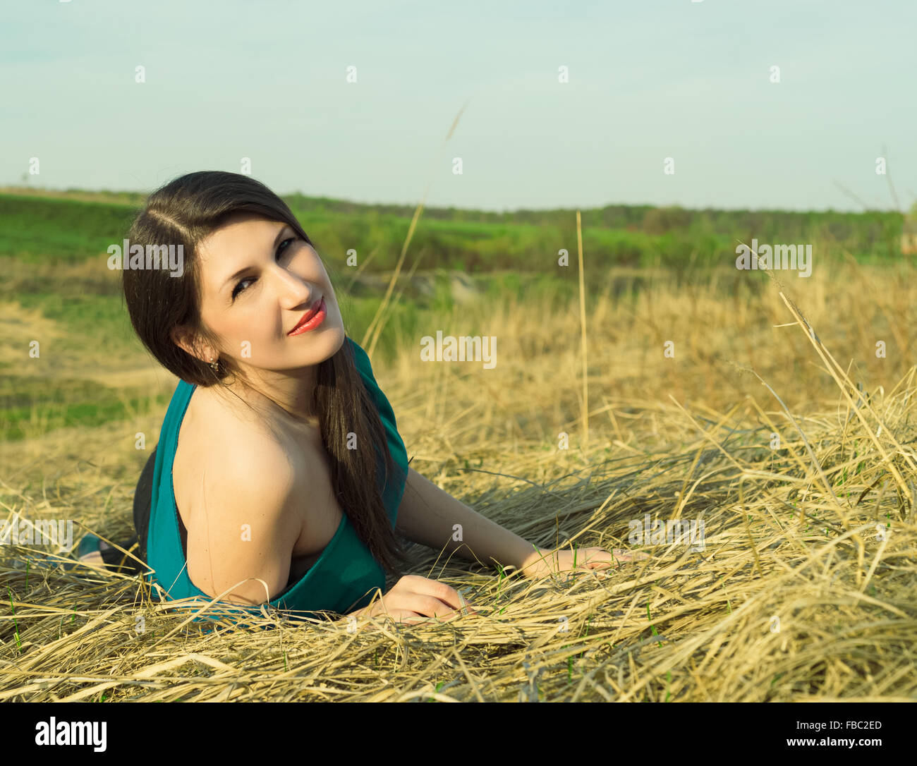 Portrait of a beautiful woman in the summer on the nature Stock Photo ...