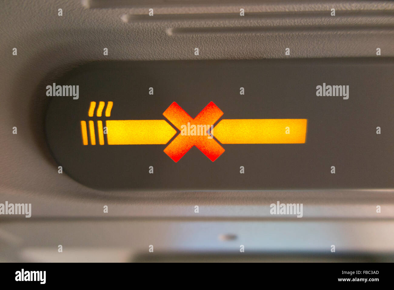 Aircraft 'no smoking' / none / non cigarette sign lit up & illuminated
