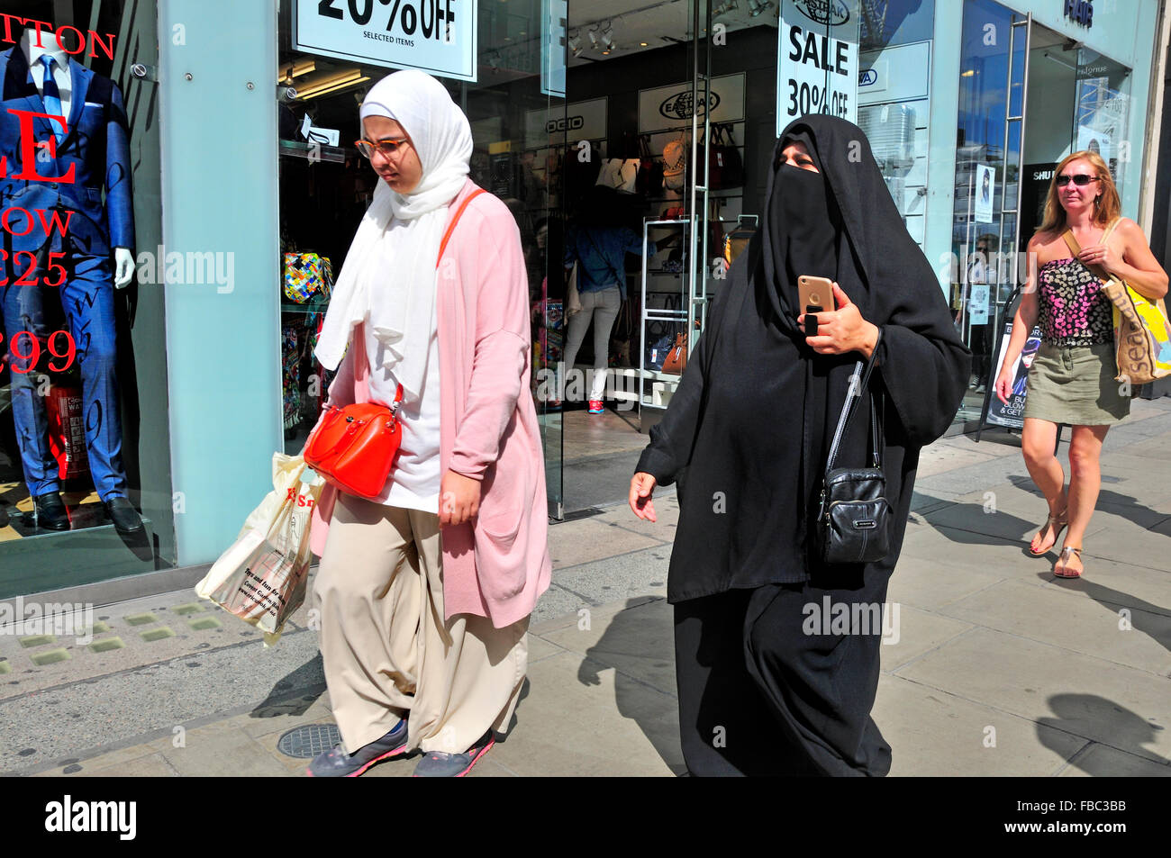 London, England, UK. Muslim women shopping in Oxford Street Stock Photo